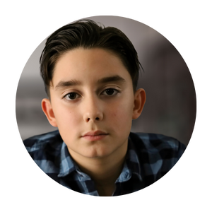 Tween boy looking into camera