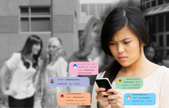 Student looking at cyberbullying messages on smartphone