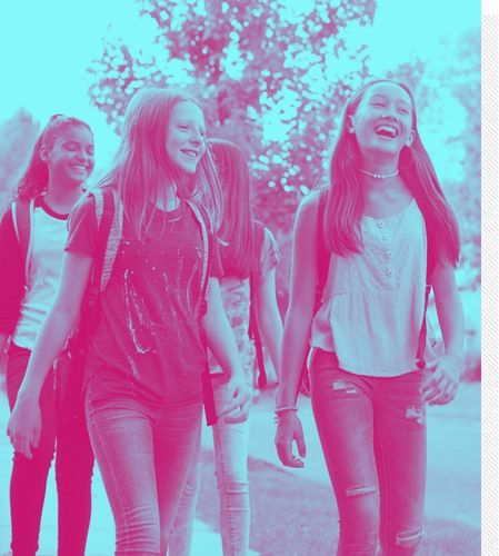 Group of young girls walking and laughing