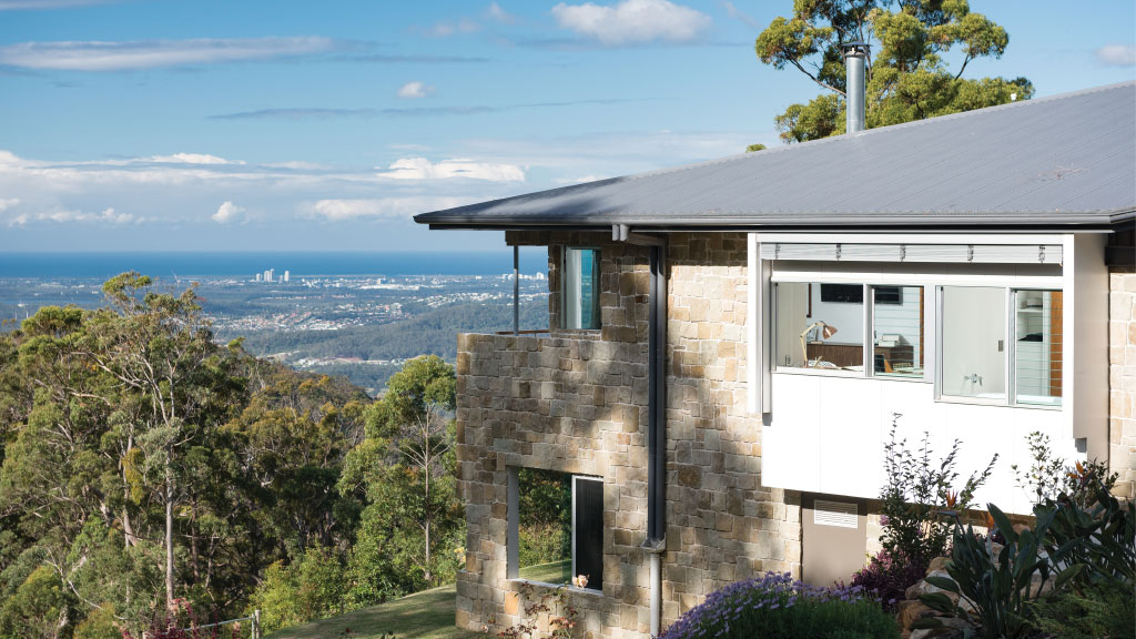 Side shot of two-story Luxury Prize Home 470 that overlooks Tamborine Mountain 